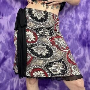 Whimsical black and red paisley skirt with black sheer mesh waist tie